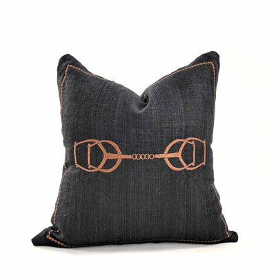 A bold weave, the metal horsebit, hand quilting and leather accents bring Equestrian Lifestyle effortlessly into the living area