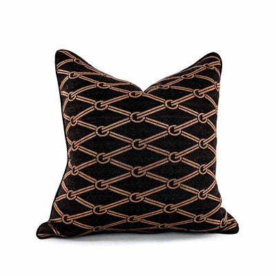 A bold weave, the metal horsebit, hand quilting and leather accents bring Equestrian Lifestyle effortlessly into the living area