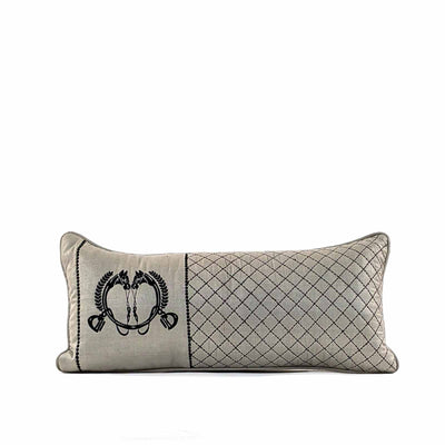 A bold weave, the metal horsebit, hand quilting and leather accents bring Equestrian Lifestyle effortlessly into the living area