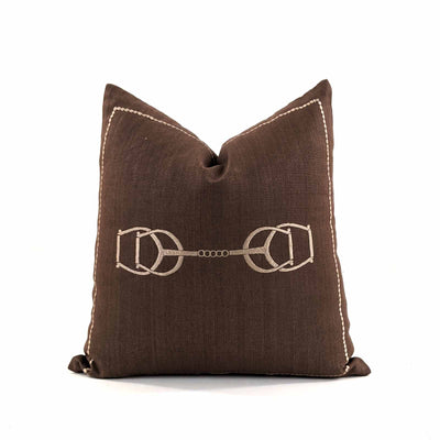 A bold weave, the metal horsebit, hand quilting and leather accents bring Equestrian Lifestyle effortlessly into the living area